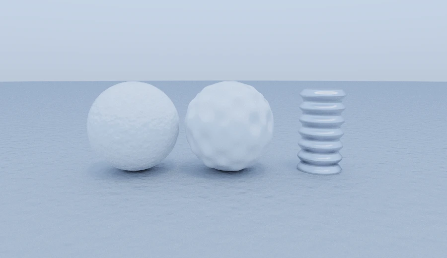 A bumped sphere with a perfect silhouette beside a displaced one whose outline is genuinely dimpled, and a column with a thread cut into it.