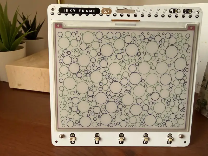 A Pimoroni Inky Frame 5.7, a seven-colour e-ink display with a Raspberry Pi RP2040 microcontroller