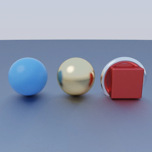 Three objects on a grey floor: a matte blue sphere, a gold one, and a matte red box wearing a chrome ring.